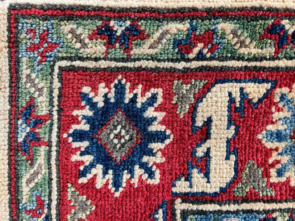 06504 Kazak Afghan Beige Red Blue 3-9×4-11 | Manoukian Rugs™ corner